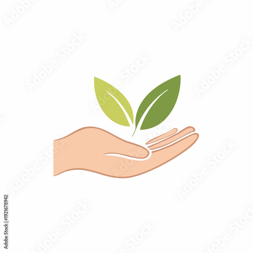 Hand holding green leaves, symbolizing growth and care for nature