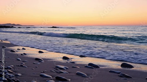 Golden Hour Coastline Wide shot of a serene, untouched coastline under soft golden light.