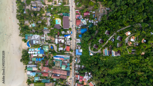 Drone aerial view of Karuna villas on the mountain near Corong Corong next to El Nido, The Philippines.