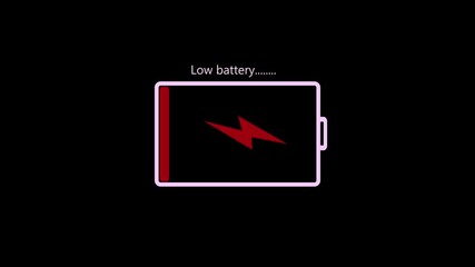 Low Battery Warning With Text And Red Lightning Bolt Inside Battery Icon On Black Background. Animated battery icon showing low charge with red lightning and warning text, modern tech alert visual.