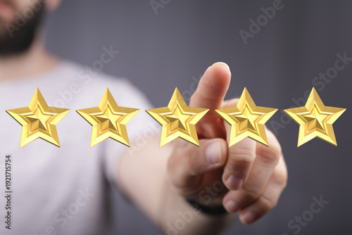 A man's hand pointing at go...