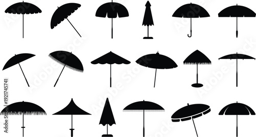 Collection of various black umbrellas and parasols in different styles and shapes on a white background