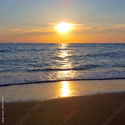 Summer golden sunset sea sky landscape.