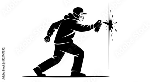 Silhouette of Graffiti Artist Spray Painting Wall with Gas Mask