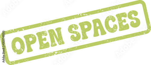 Refreshing green rubber stamp with the words Open Spaces signifying freedom and expansive natural environments