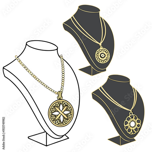 Gold pendants on necklaces displayed on black and white jewelry busts
