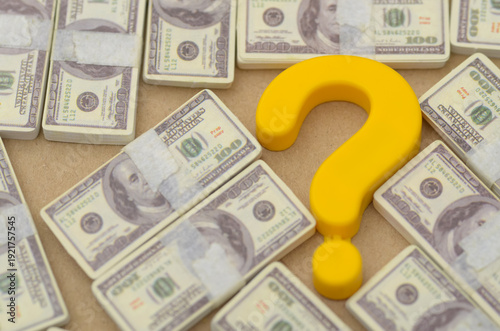 Money and Question Mark Symbolizing Budgeting and Risk