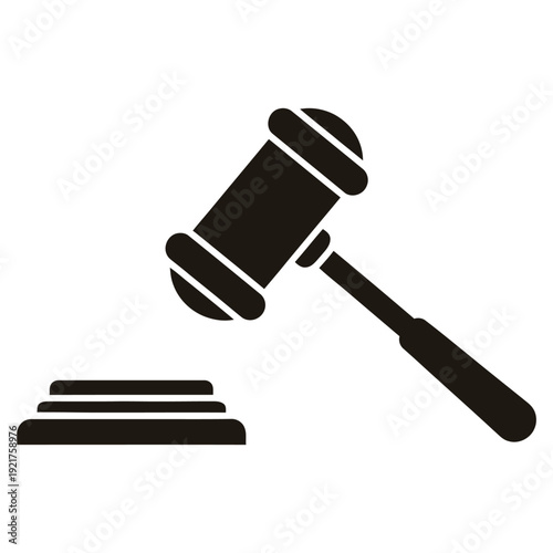 A black judge's gavel resting on a sound block, symbolizing law and justice.