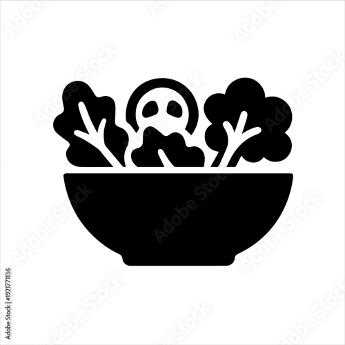 A black silhouette of a bowl filled with broccoli and a skull against a white background