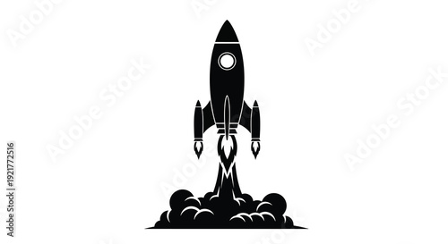 Rocket launching with fiery exhaust trail a dramatic silhouette