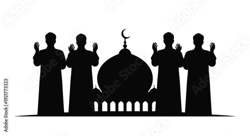 Muslim men praying with a mosque in the background silhouette