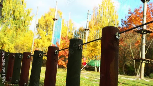 Wallpaper Mural Small girl with helmet in adventure park Torontodigital.ca