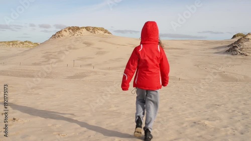 Wallpaper Mural Little girl on the white sand dunes of Leba Torontodigital.ca