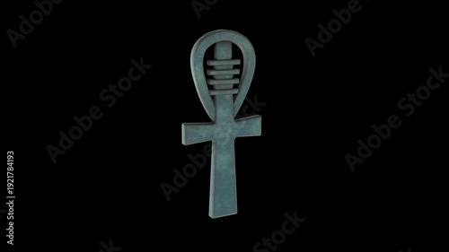 Ancient Egyptian ankh symbol of life, rotating slowly against a dark background, representing eternity and rebirth. animation