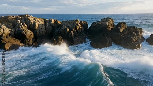Wallpaper Mural Coastal waves crashing onto rocky outcroppings creating dynamic seascapes and foam Torontodigital.ca