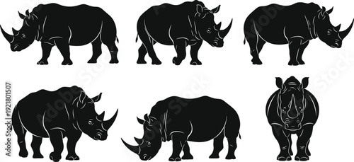 Black and white rhinoceros vector set, wild animal silhouettes standing and walking, isolated flat graphic design on a white background.