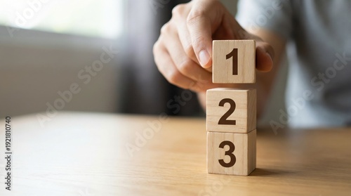 Business Strategy Optimization with Step-by-Step Planning Using Numbered Wooden Blocks and Hands for Process Workflow Efficiency and Sequential Growth Concept Visualization
