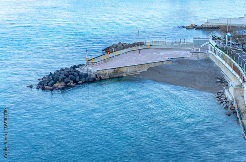 Small beach with terrace, protected from the wawes