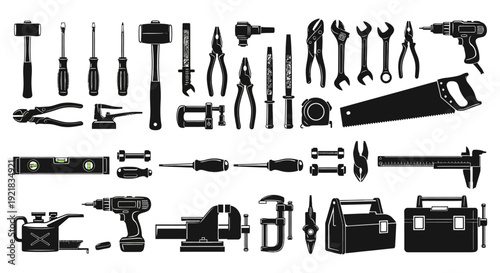 A black silhouette collection of various hand and power tools arranged in horizontal rows high quality