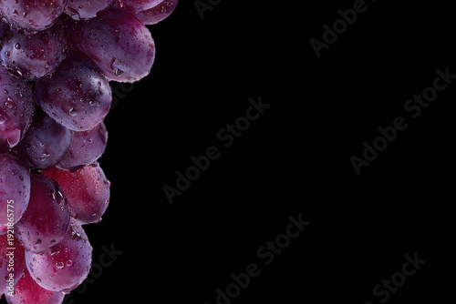 bunch of red grapes isolated on black