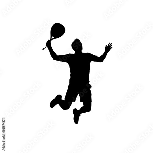 Silhouette of a man jumping with a tennis racket, celebrating a victory