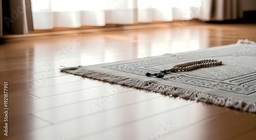 Bright Interior Shot of Praying Rug with Rosary Beads for Worship