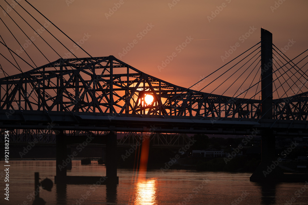 Fototapeta premium Bridge Silhouette at Sunset Over River