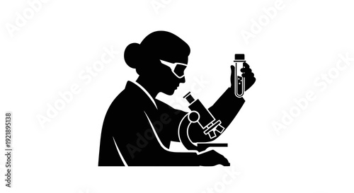 Scientist examining a sample in a laboratory setting.