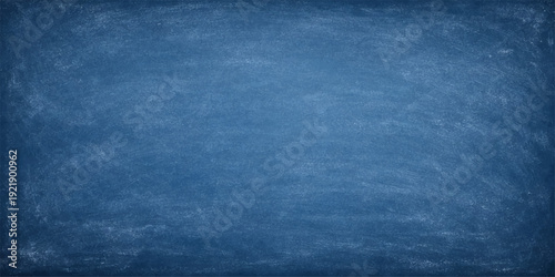 A dark blue grunge background features a rough vintage texture with a deep indigo denim fabric pattern on an old canvas surface