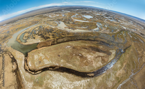 Aerial view over a wetland landscape with rivers and lakes on the pampas in the vicinity of the village of Gobernador Gregores, Santa Cruz Province Argentina