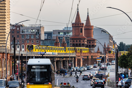 Photography Busy cityscape showing Oberbaum Bridge, U-Bahn, and cars