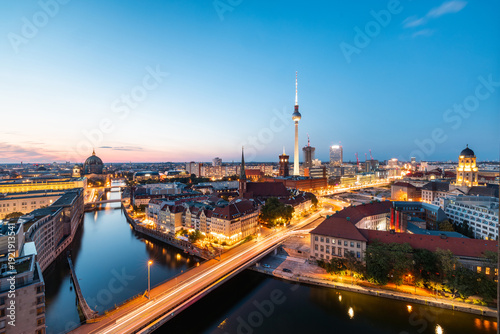 Berlin cityscape twilight view showing TV Tower and bridges