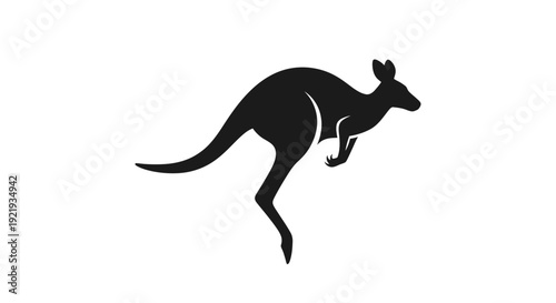 Black silhouette of a kangaroo jumping.