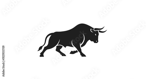Black bull running with horns forward.