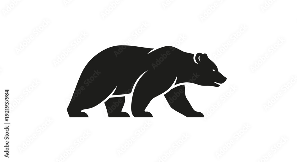 Obraz premium Black bear walking on ground.