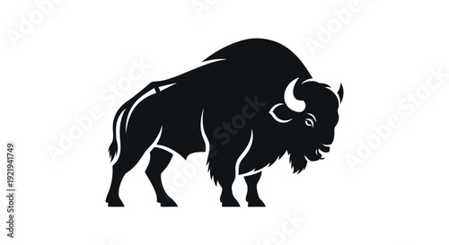 Black silhouette of American bison standing.