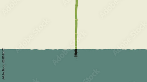 Minimalist composition of a green bamboo pole rising from water. Peaceful and serene