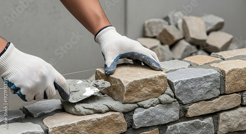 Hands Laying Stone Paver