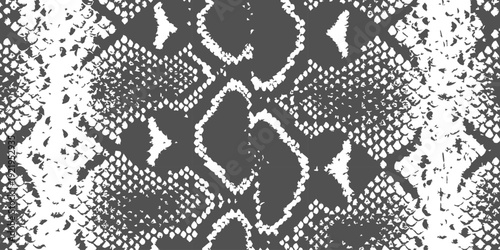 Seamless black and white snake skin pattern with textured scales, a wild animal print background for fashion and design
