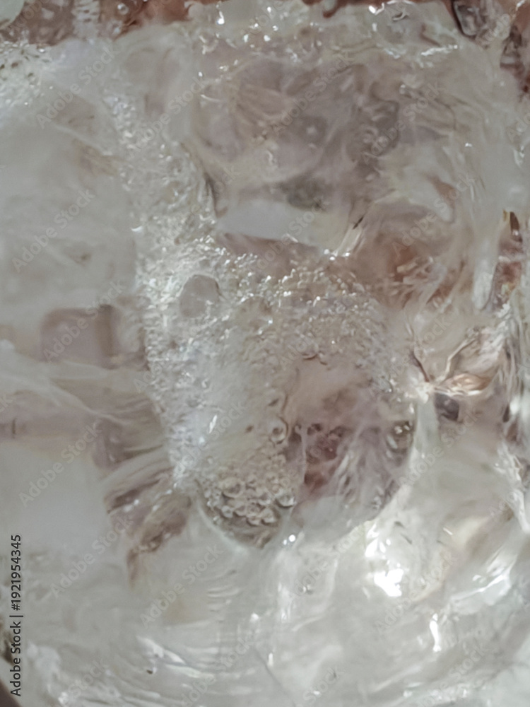 Obraz premium Water splashing with bubbles creating abstract liquid texture