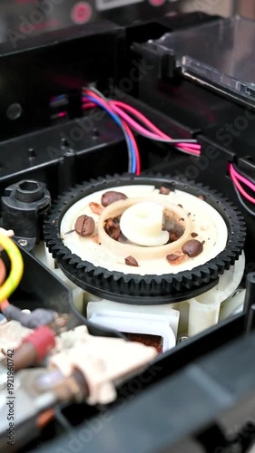 Professional test, repair and cleaning technician for coffee machine parts with a sprocket grinder for whole bean and espresso, both commercial and home. Internal parts. Boiler. Cleaning.	