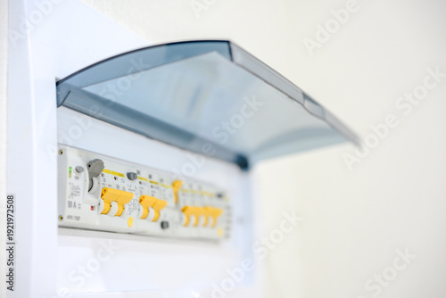 Electrical distribution board with circuit breakers and protective cover