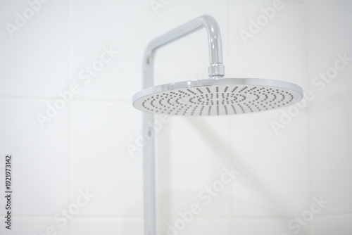Modern showerhead design with chrome finish and circular shape