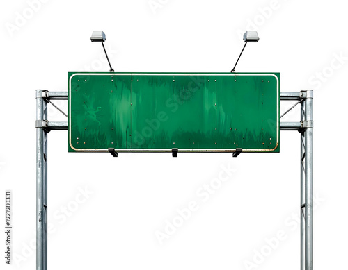 A weathered green road sign, blank against a black background