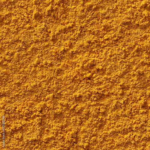 Seamless pattern of dried turmeric powder for infinite repeating backgrounds or textures