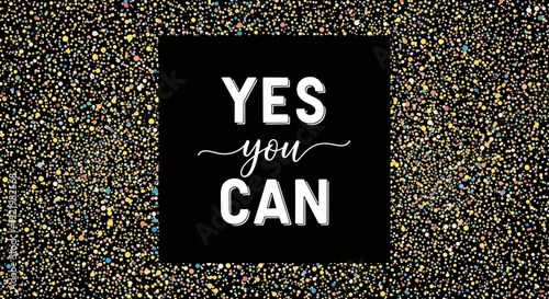 Inspirational message on a black square with multicolored speckles