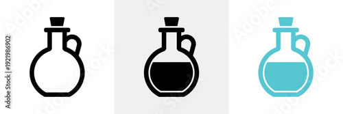 Three laboratory flasks with different colored liquids