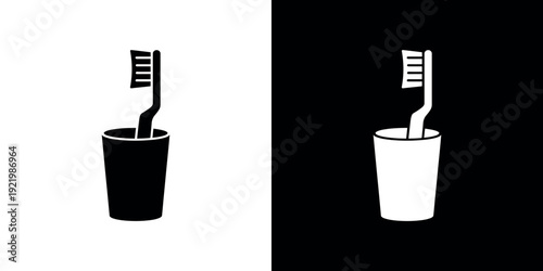 Toothbrush in a Cup on Black and White Background dental