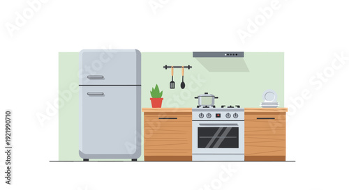 A compact and modern kitchen interior features a standalone refrigerator next to a wooden cabinet with a gas stove and oven, set against a light green wall.