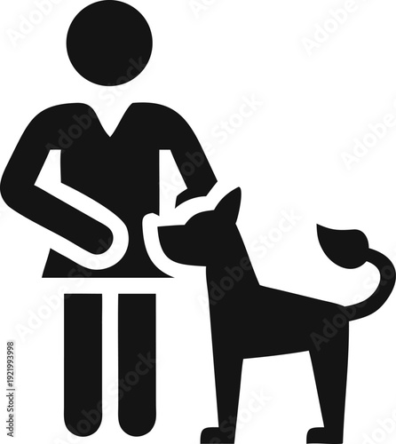 A person gently petting the head of a loyal domestic dog